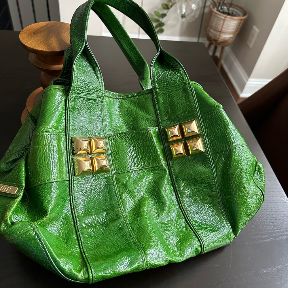 Gently Used Shih Green Patent Leather handbag. Super clean inside